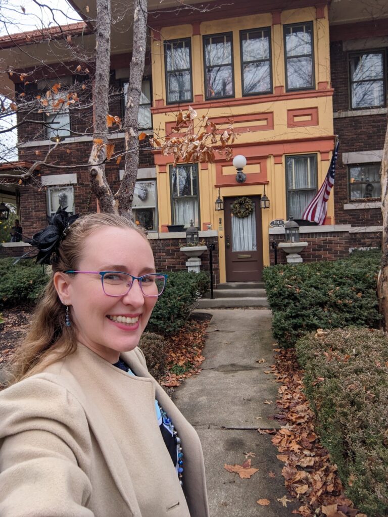 Lindsay in front of Anna Marie's Teas Tea Party Home