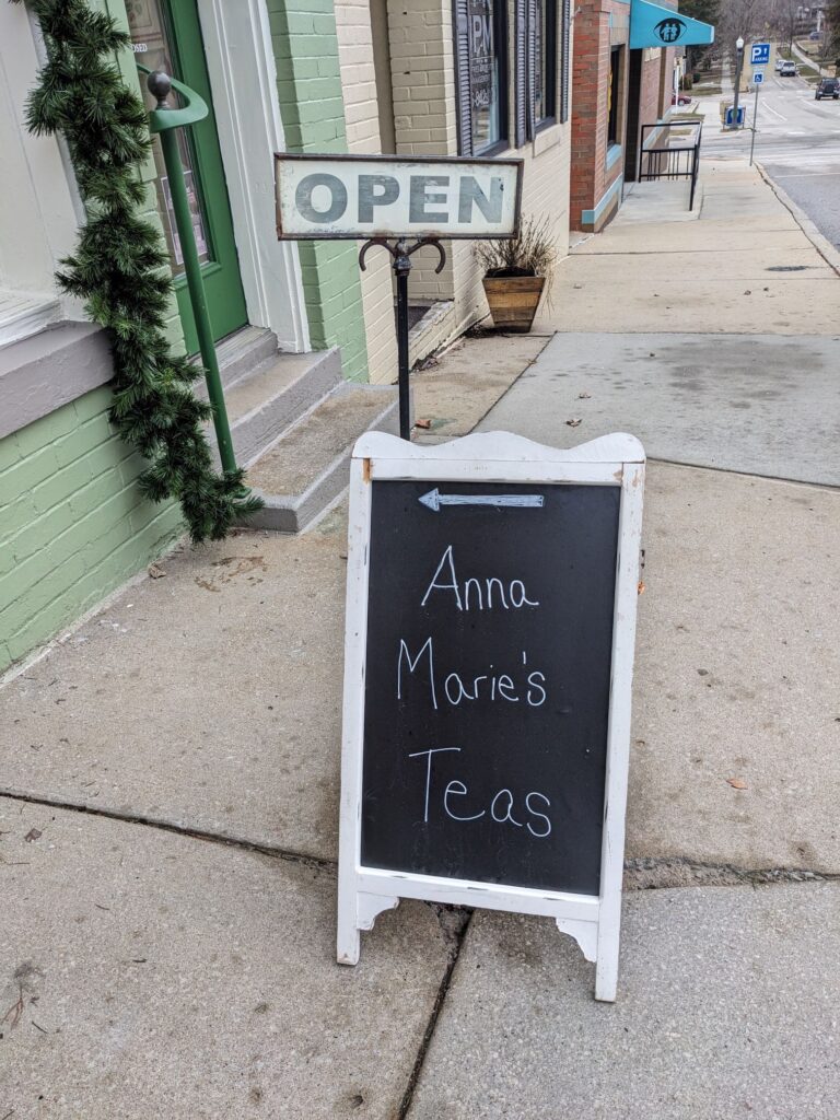 Anna Marie's Teas Open Sign off the Liberty Square